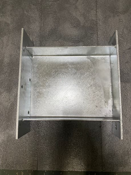 Galvanized steel tray-shaped bracket component with mounting holes